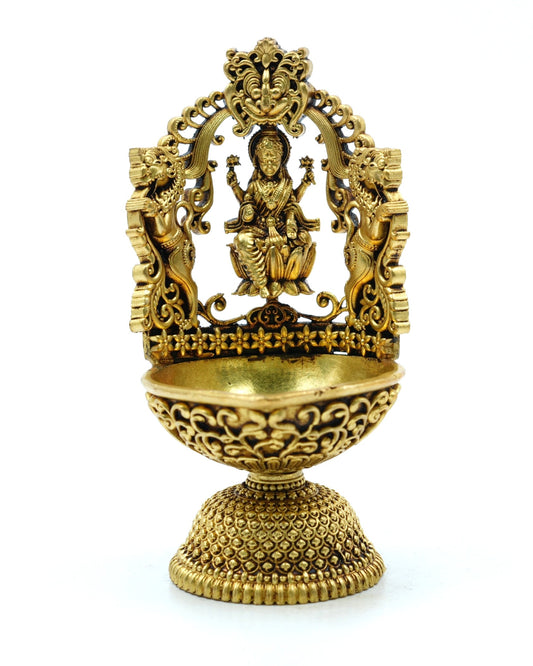 Brass Lakshmi Diya – Ornate Pooja Oil Lamp with Arch