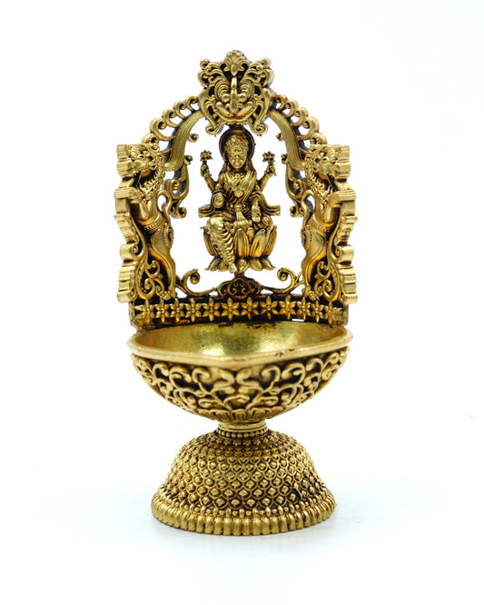 Brass Lakshmi Deepam – Ornate Pedestal Diya with Elephant Arch