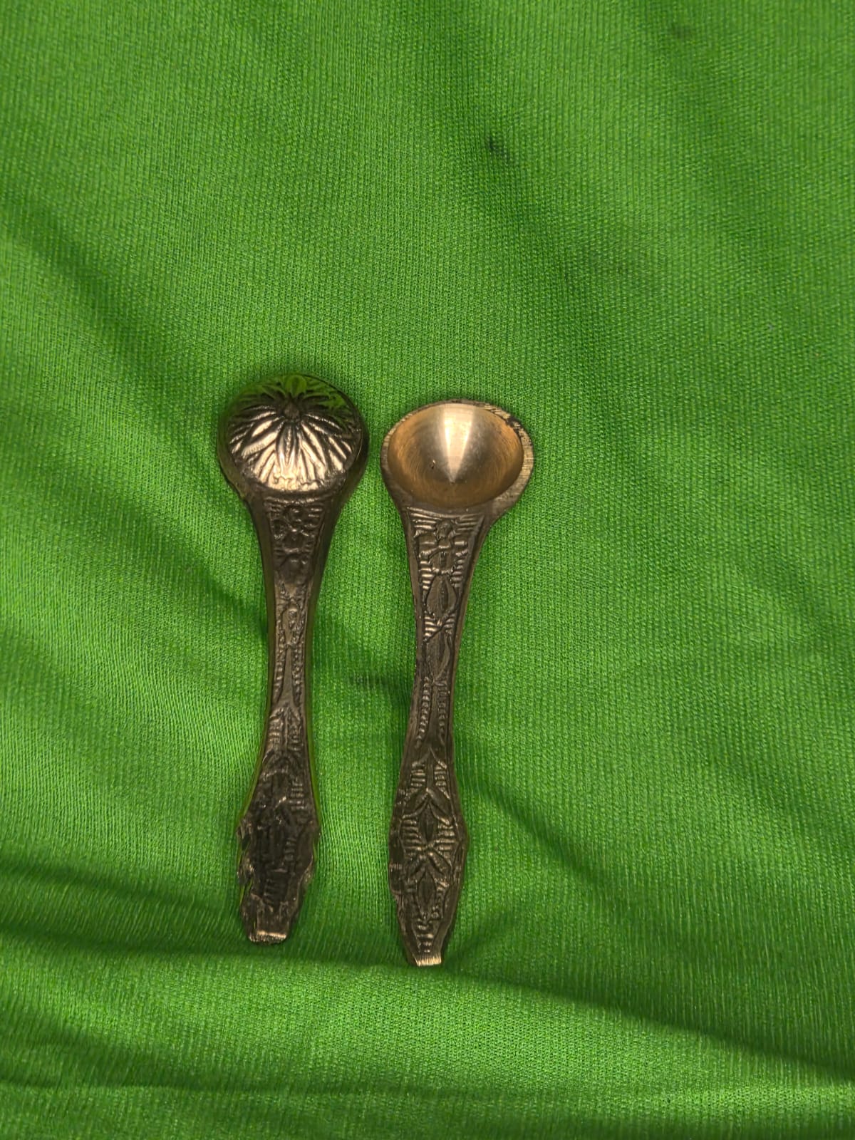 Brass spoons with design