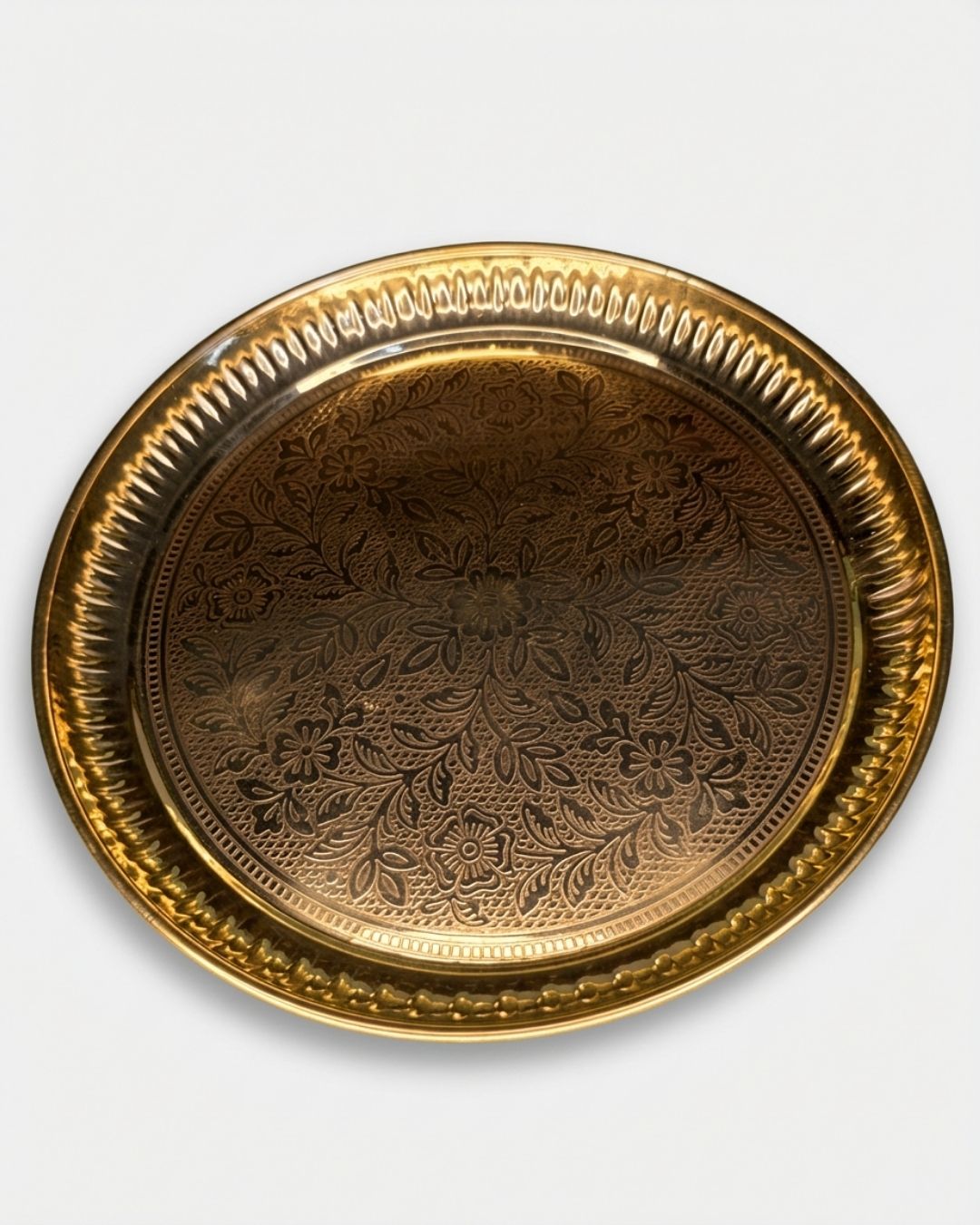 Round brass plate with dainty design in antique touch