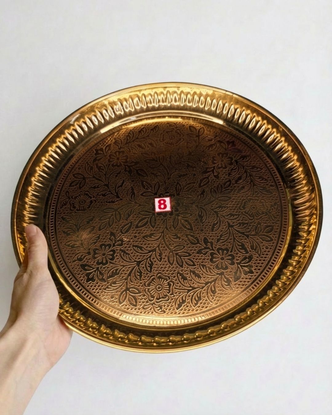 Round brass plate with dainty design in antique touch