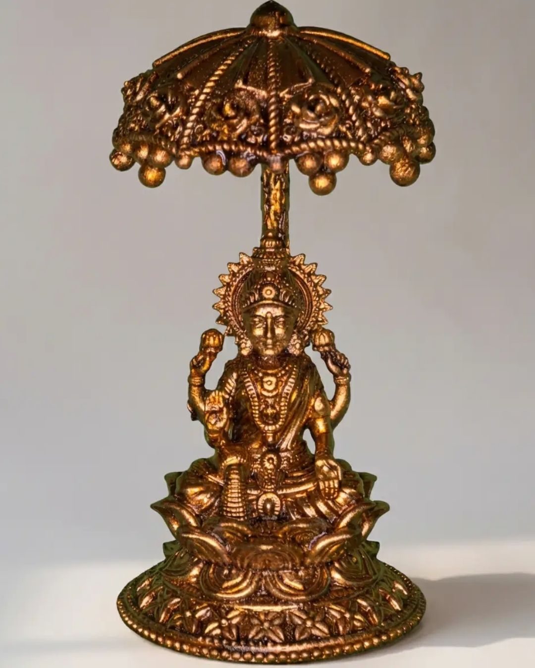 Lakshmi with Umbrella