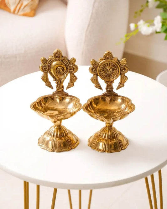 Beautiful and auspicious pair of shaku chakra diyas