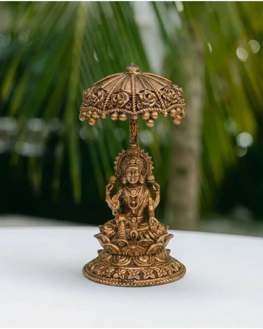 Lakshmi with Umbrella