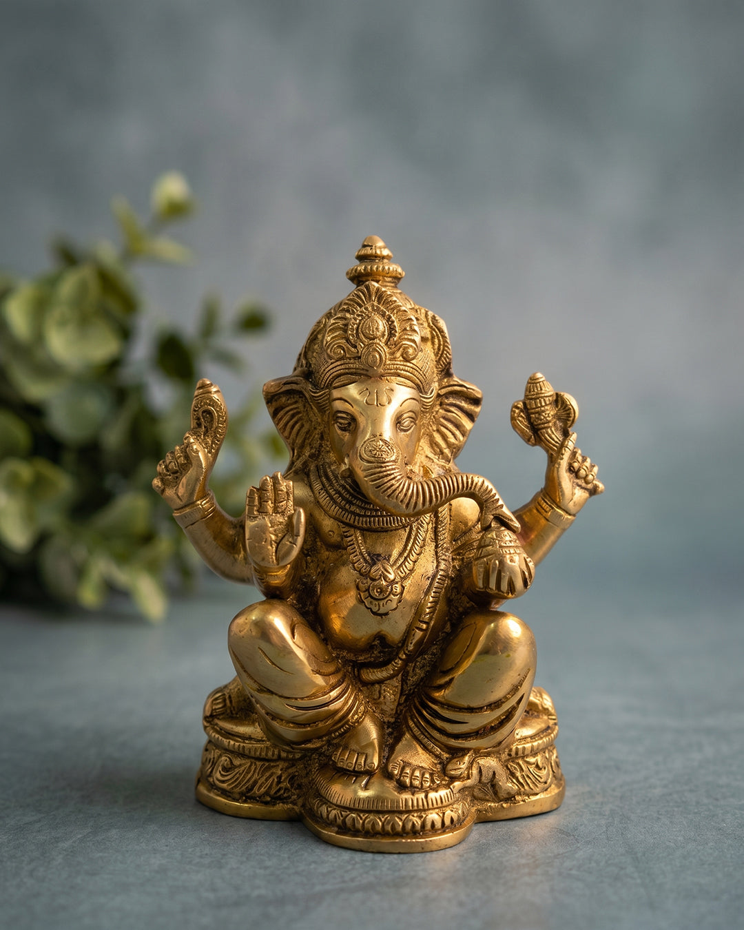 Ganesha Sitting on Base – 3.5 Inches Gold Finish Idol