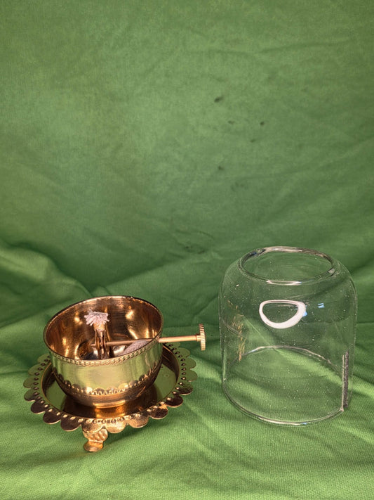 Medium sized brass akhand diya with glass cap