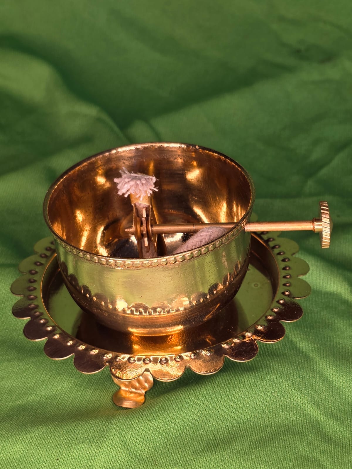 Medium sized brass akhand diya with glass cap