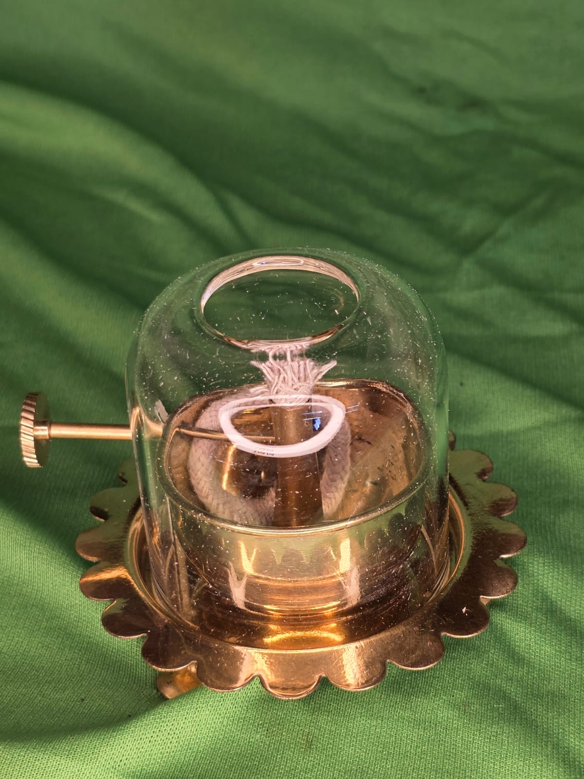 Medium sized brass akhand diya with glass cap