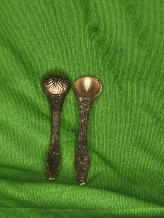 Brass spoons with design